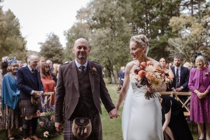 bride and groom married in scottish woodland cardney steading