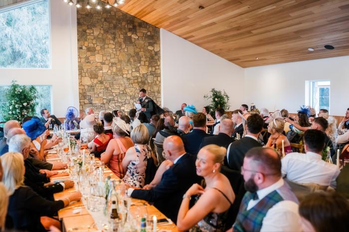 guest at table dining in the dalradian cardney steading weddings